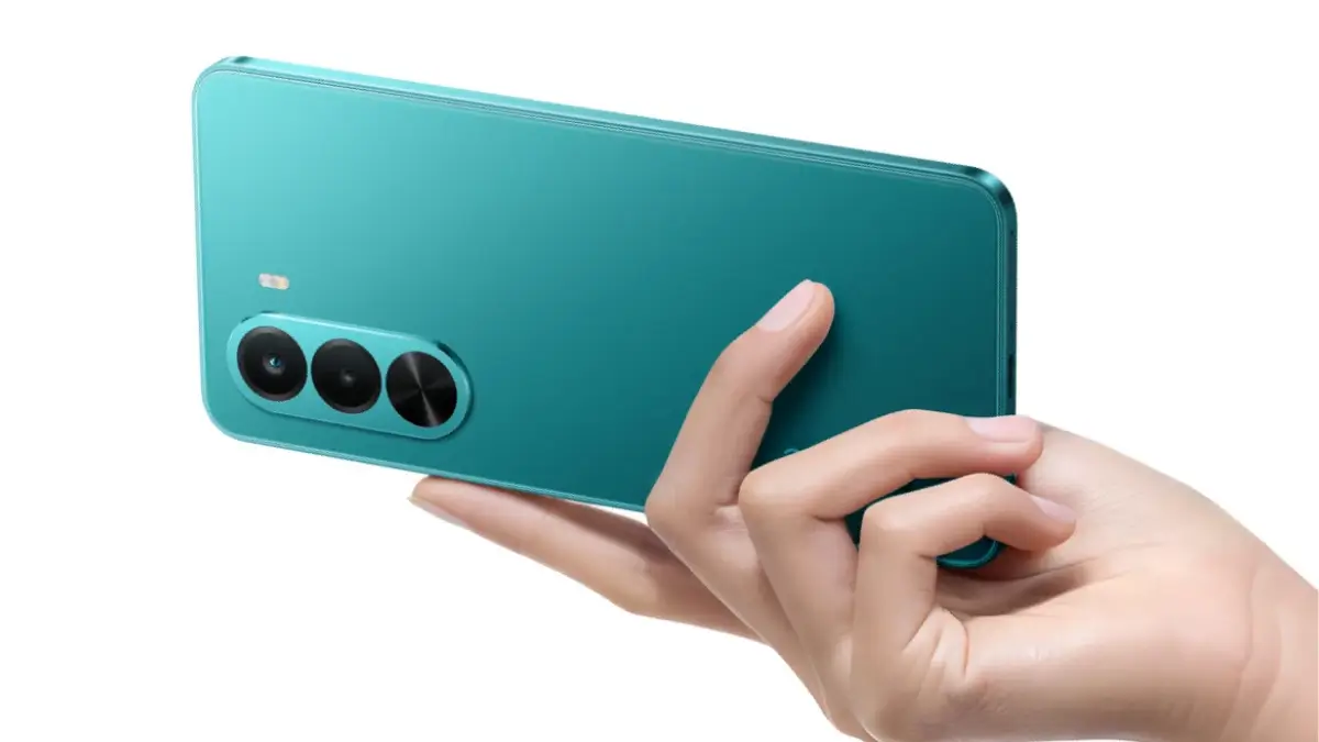 Realme P4x in Lake Green showing dual camera module being held in hand
